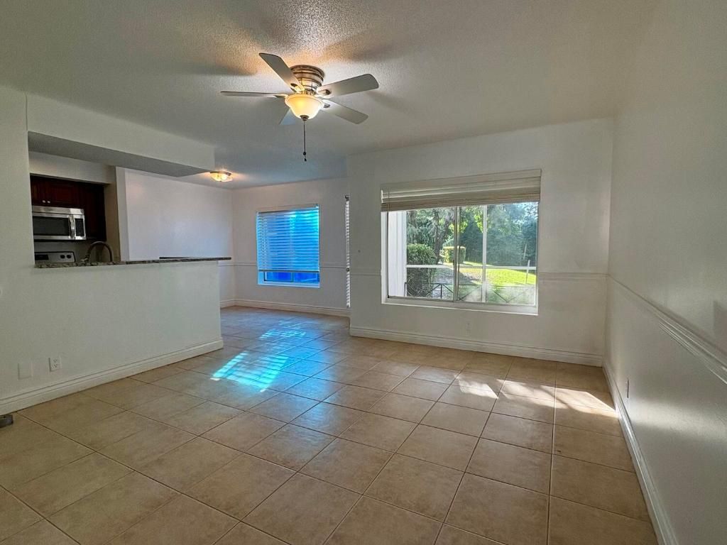 Photo of 815 W Boynton Beach Boulevard #4-102, Boynton Beach, FL 33426 (MLS # R11136579)