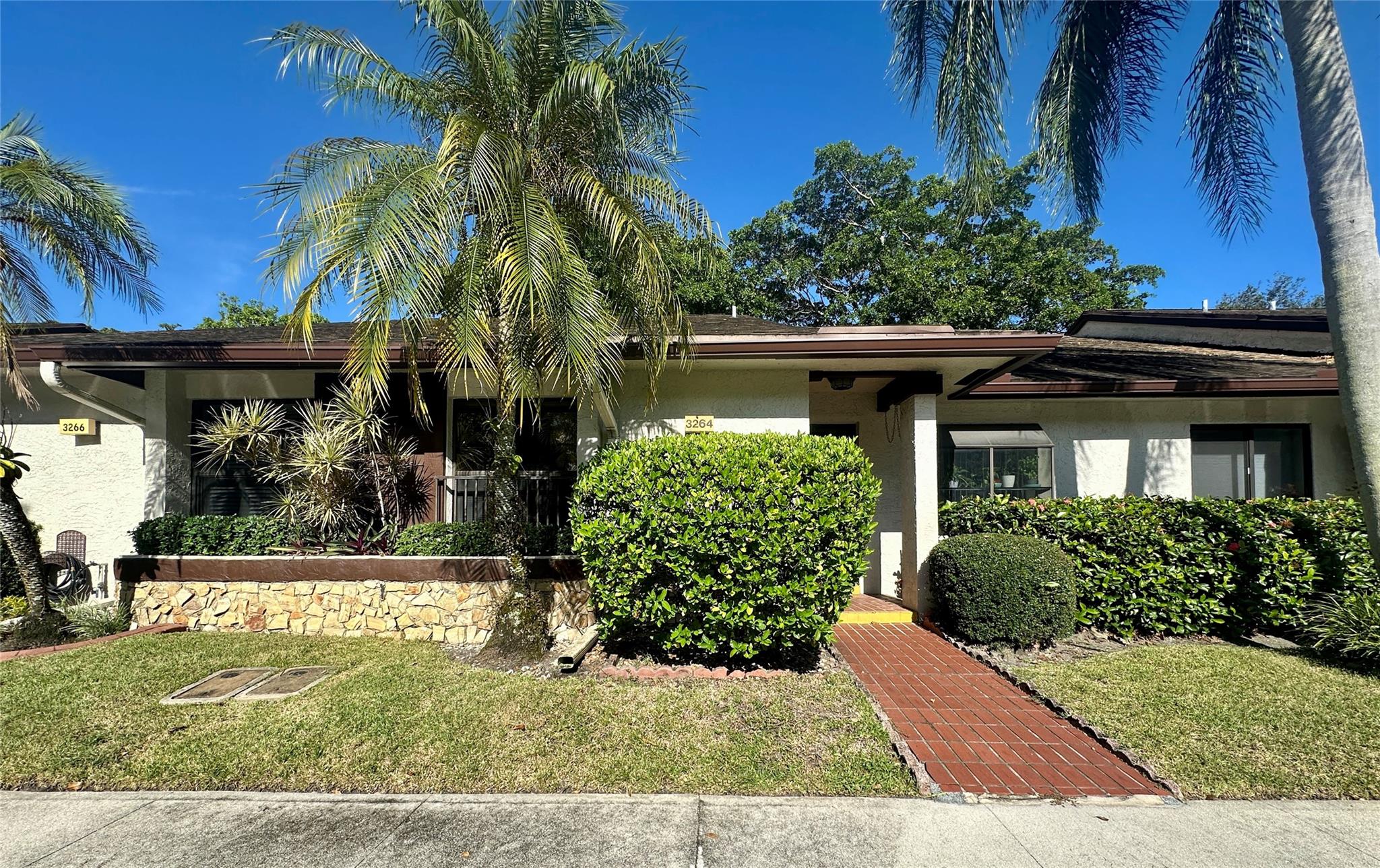 NEW ROOF (2025)! Beautifully updated 2BD/2BA villa in the desirable Township community, now offered at $342,000 for a fast sale! Move-in ready and designed for comfort, harmony, and effortless living, this home features vaulted ceilings, tile in the main living areas, and luxury vinyl in bedrooms. The remodeled kitchen boasts custom cabinetry, quartz countertops, upgraded lighting, and stainless-steel appliances. A glass-enclosed family room overlooks serene lake views—perfect for peaceful mornings or entertaining. The spacious primary suite includes a renovated bath and ample closet space. Township amenities include pools, tennis, fitness center, clubhouse, and more. With a new roof and an unbeatable price, this villa blends lifestyle, beauty, and balance—your perfect place to call home!