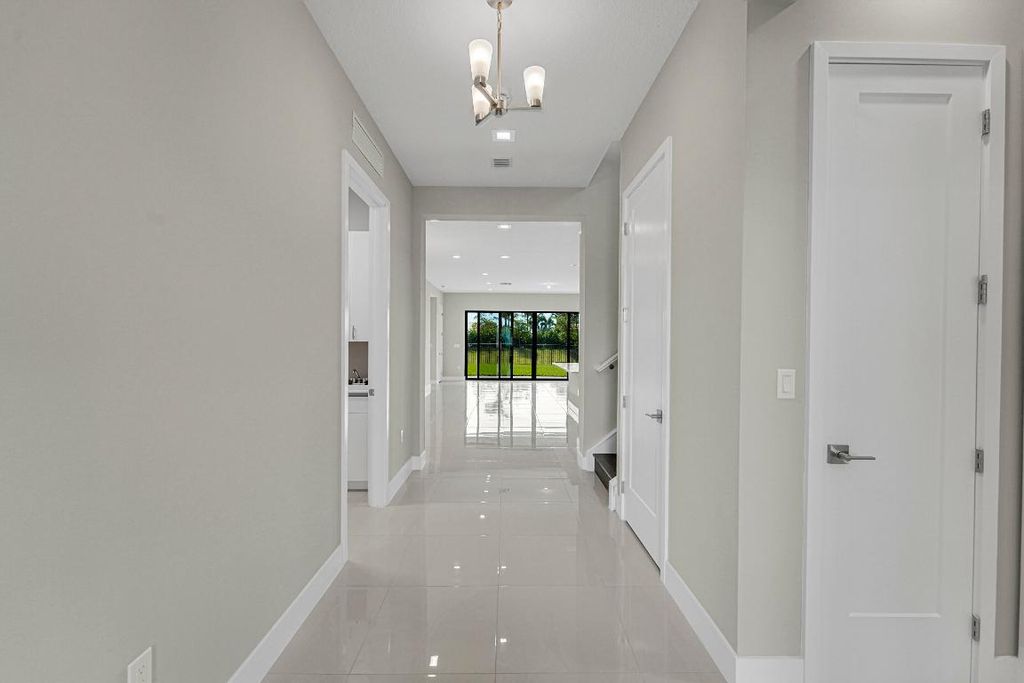 Photo of 13045 Feathering Way, Palm Beach Gardens, FL 33412 (MLS # R11066927)