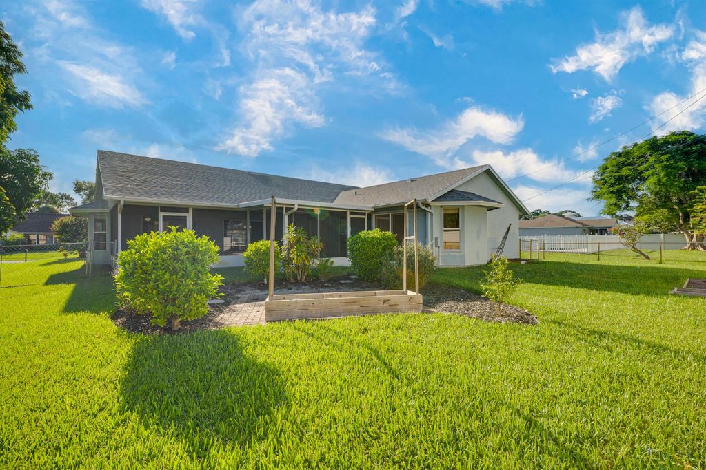 Photo of 3255 SW Foremost Drive, Port Saint Lucie, FL 34953 (MLS # R11117159)