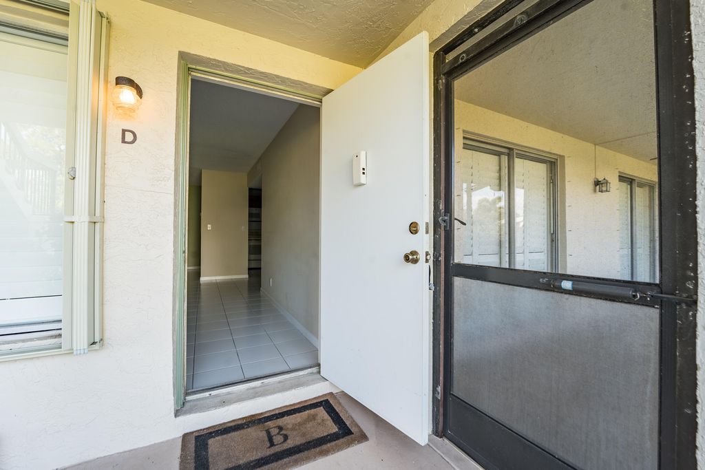 Photo of 6341 Chasewood Drive #D, Jupiter, FL 33458 (MLS # R11159231)