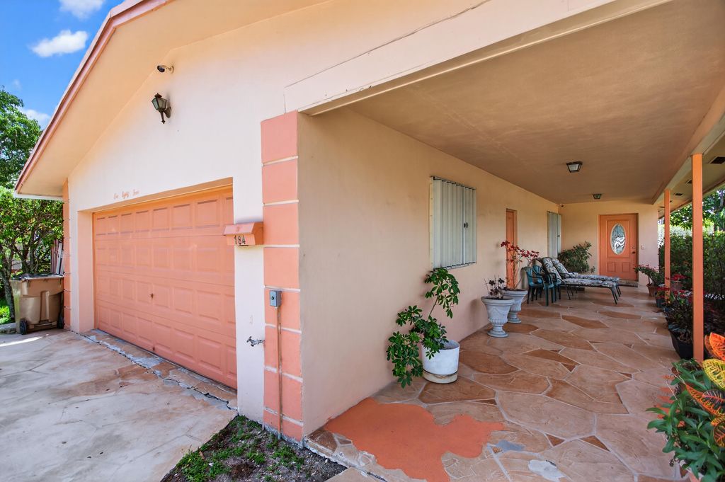 Photo of 184 SW 2nd Court, Deerfield Beach, FL 33441 (MLS # B26008322)