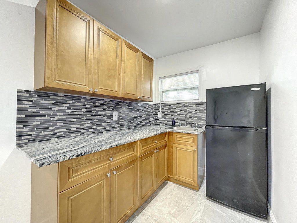 Photo of 2649 Johnson Street #Unit 2, Hollywood, FL 33020 (MLS # B26083196)
