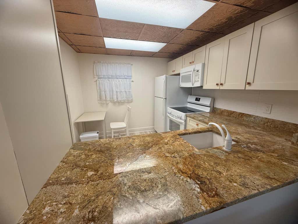 Photo of 2601 NE 3rd Court #202, Boynton Beach, FL 33435 (MLS # B26050291)