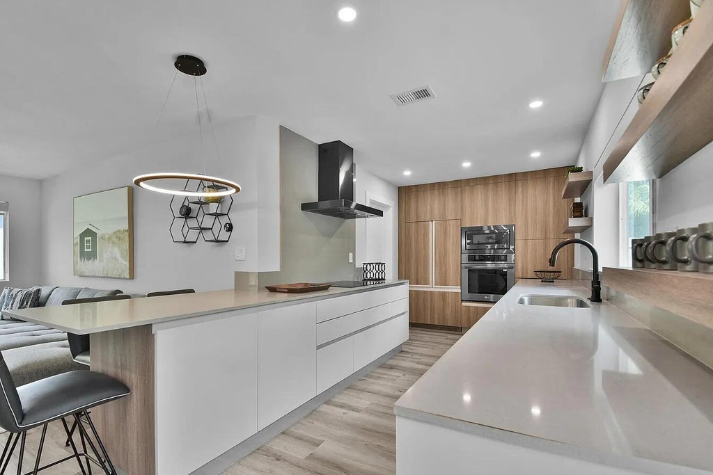 Photo of 803 BLUEBIRD Drive, Delray Beach, FL 33444 (MLS # B26063658)