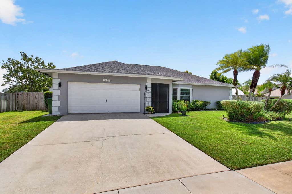 Photo of 1630 Tamarack Way, Wellington, FL 33414 (MLS # B26058696)