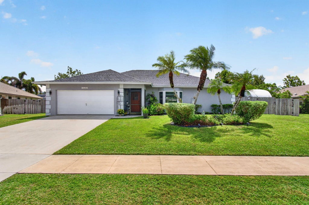 Photo of 1630 Tamarack Way, Wellington, FL 33414 (MLS # B26058696)