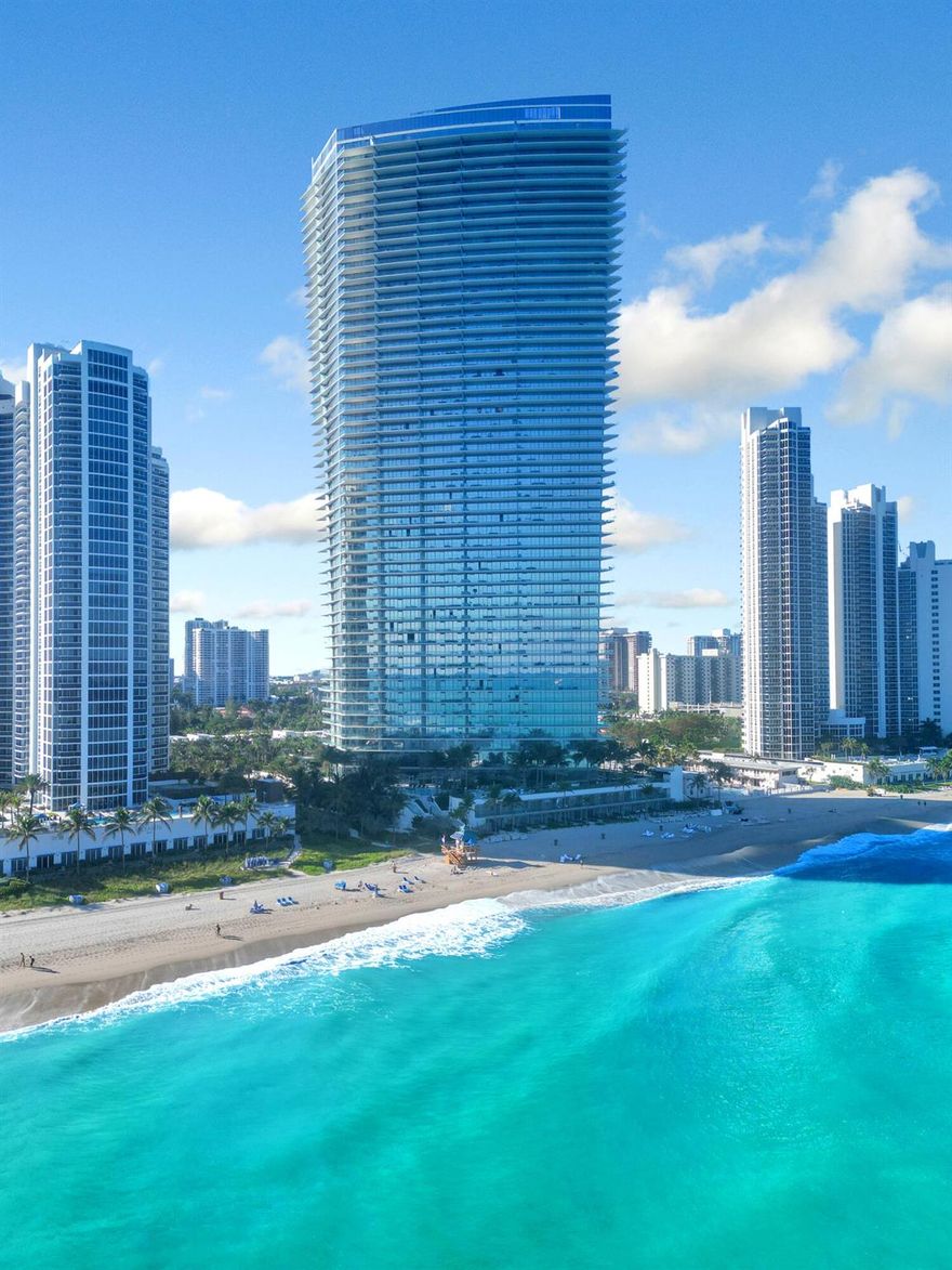 Armani/Casa is an unparalleled experience cultivated by renowned designer Giorgio Armani and famous architect, Cesar Pelli, situated in the heart of Sunny Isles.  Within this stunning building is unit 3201, a fully furnished 4,019 sq ft ocean and intracoastal facing unit entirely designed and detailed by the reputable Steven G Interiors.  Cesar Pelli's iconic 'glass skins' design is exemplified in the Armani tower with 56 floors of reflective glass accentuating the blue tones of the Atlantic Ocean.  Comprised of 308 units, there is no other property like 3201.  With 3 bedrooms, a den and 5 and a half bathrooms, this property is part of the exclusive '01 line within the Armani building granting some of the best direct ocean and intracoastal views in all of Sunny Isles.