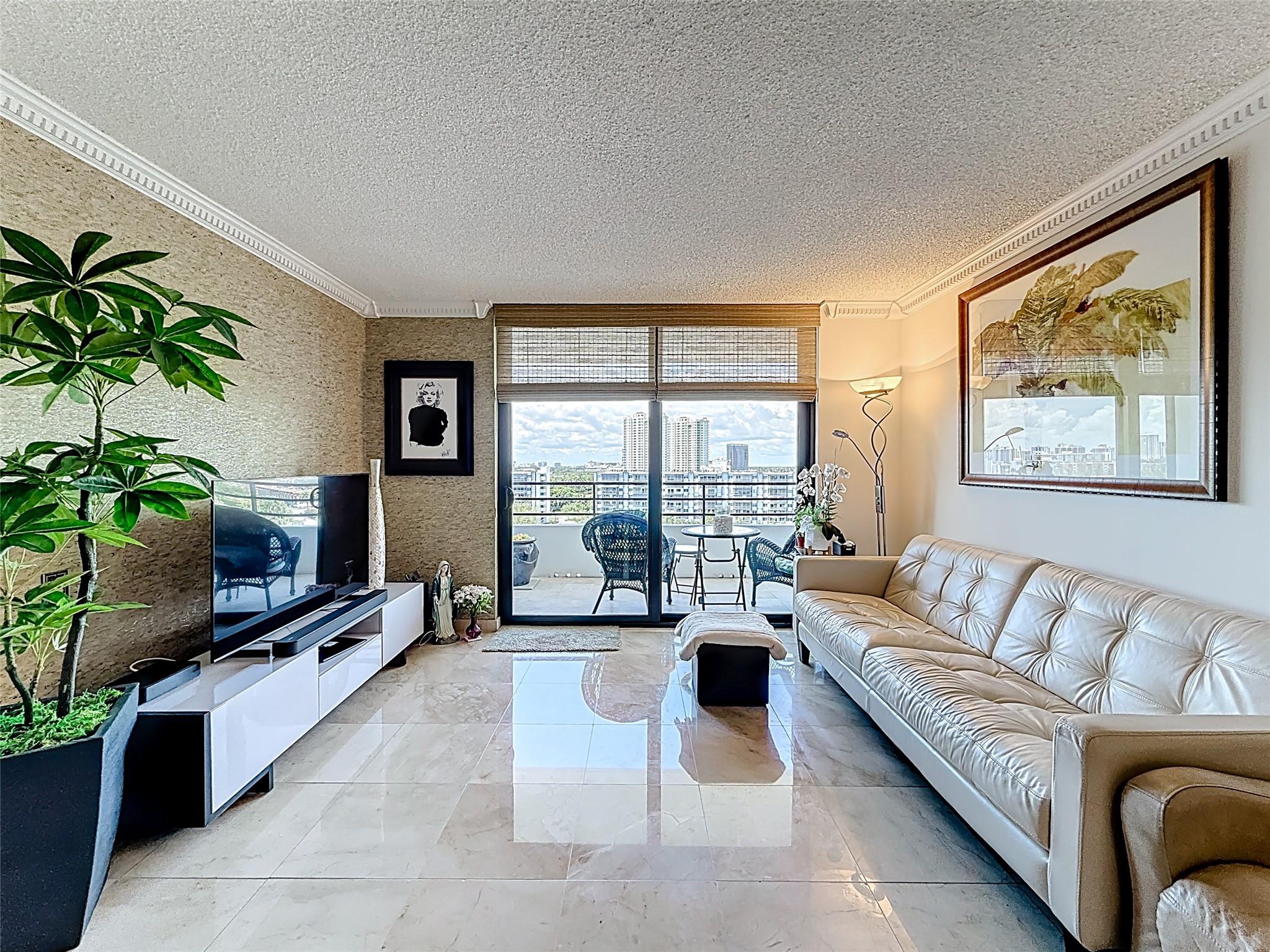 Beautiful 2-bedroom, 2-bath residence located in the desirable Olympus Towers. This spacious unit offers stunning views and access to a wide range of resort-style amenities, including pool, fitness center, tennis courts, and more. Prime location close to shops, dining, and the beach. Perfect for enjoying a vibrant and convenient lifestyle.