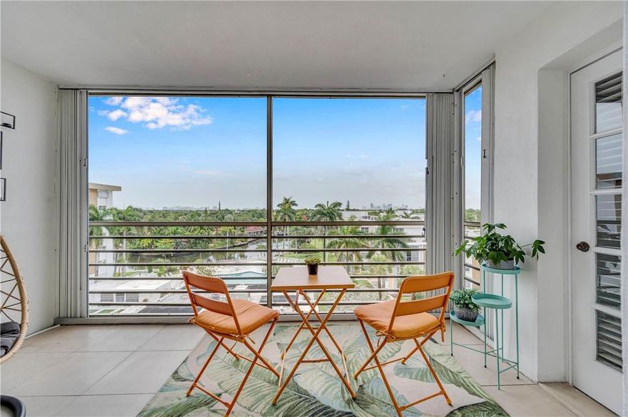 Incredible renovated mid-century modern 2 bed, 2 bath condo with spectacular winding river and skyline views Wonderful screened patio. Open kitchen features modern cabinets, European appliances, mosaic tile backsplash, and a large Caesar stone breakfast bar. Bathrooms remodeled with high-end finishes. Upgrades include impact windows/doors, newer A/C, Newer Hot Water Heater,  porcelain flooring, fresh carpet in bedrooms. Situated in a secure, gated community centrally located and adjacent to Wilton Manors with an abundance of dining & shopping options. Amenities include a heated riverfront pool; refinished tennis courts; exercise room; sauna; and clubhouse with kitchen. Cable is included in monthly maintenance; dockage is available on a first-come first-served basis for boats up to 25 ft
