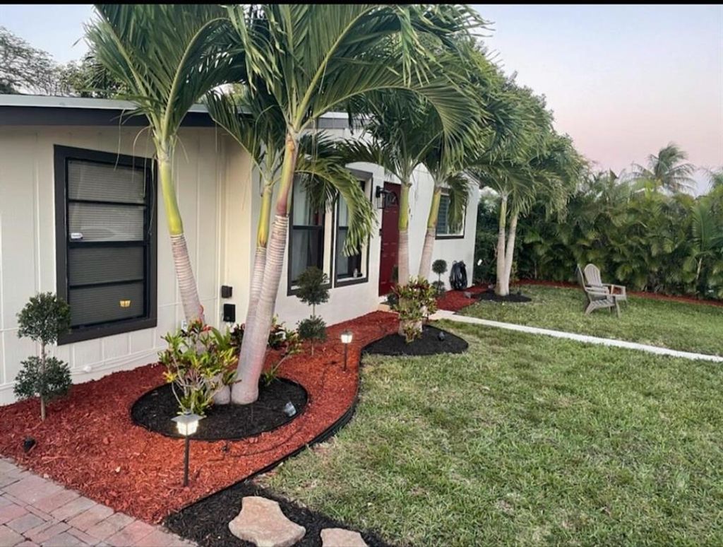 Photo of 587 Chipewyan Drive Dr, Lake Worth Beach, FL 33462 (MLS # R10742621)