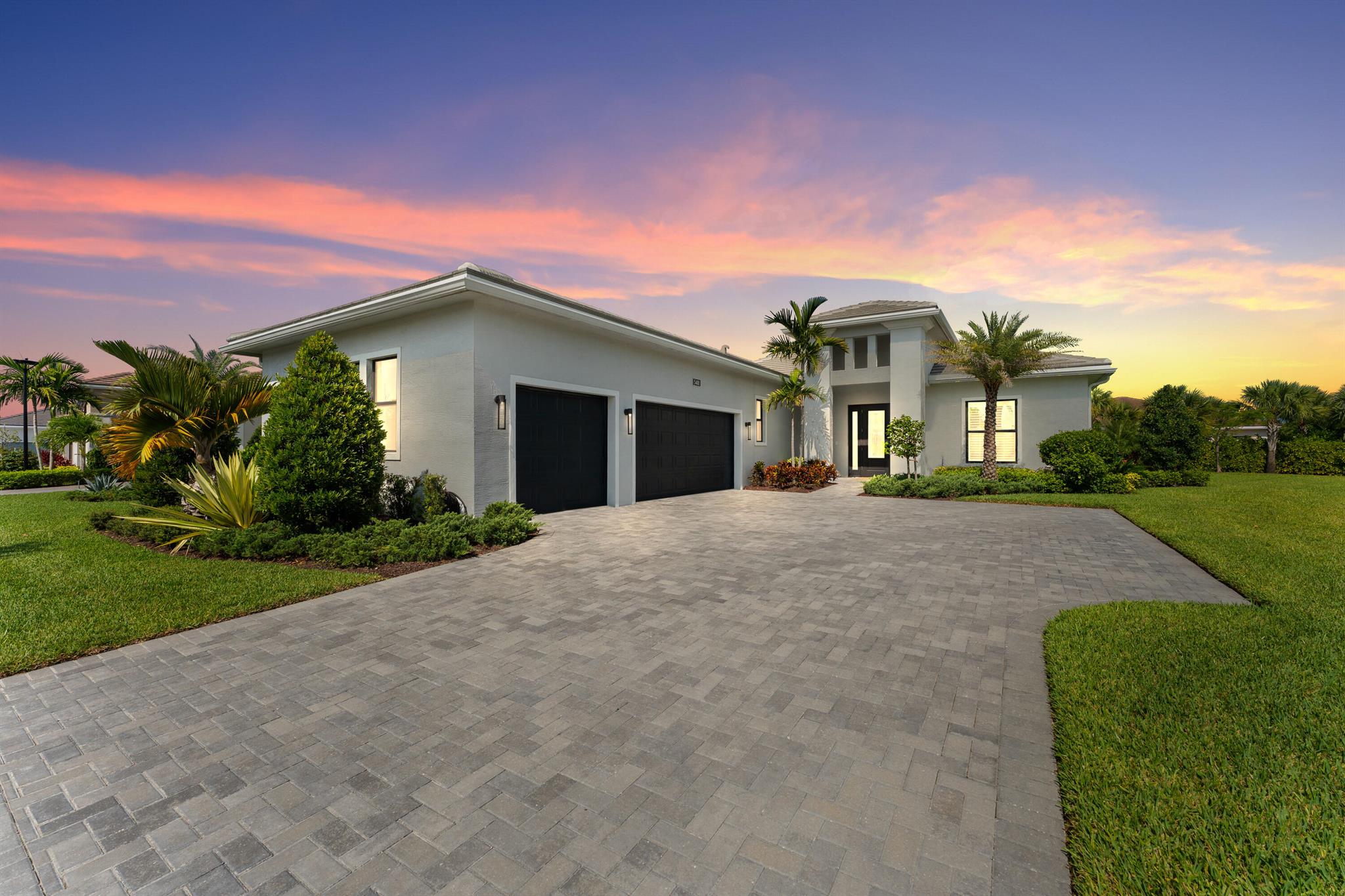 Luxurious Rosemary Model on Private Corner Lot with Saltwater Pool & 3-Car Garage in Stunning Cresswind at Westlake!Located in the highly sought-after Cresswind community within Palm Beach County's newest city, Westlake, this beautifully upgraded Rosemary Model offers 2 bedrooms, 2.5 bathrooms, a versatile club room that can easily serve as a third bedroom, and a dedicated working den/office--perfectly designed for both luxury and everyday living. Sitting on a private, oversized corner lot, the home showcases a gourmet kitchen with a dramatic waterfall-edge quartz island, upgraded GE Monogram stainless steel appliances, pull-out cabinet shelves, a butler's pantry, dry bar with LED lighting, and built-in surround sound speakers, ideal for entertaining in style.