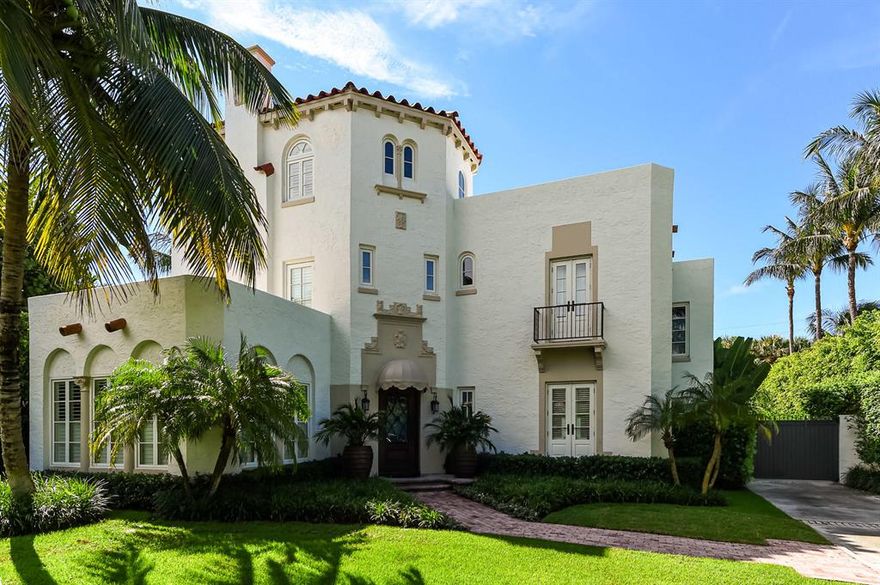 Three-story Mediterranean Revival style residence located in-town on a coveted ocean block.  This property has been meticulously renovated offering all the modern life-style needs yet has retained the integrity of its original style. The residence's main house has 4BR/4.5BA and abounds with beautiful architectural details throughout. The residence features fabulous entertaining areas including an oversized living room with fireplace, formal dining room and library; the master bedroom suite has its own fireplace and balcony. Highlights include soaring 10' ceilings, plaster molding and trim, oak hardwood floors, custom-made curved stairway and railing, mahogany impact windows and doors, elevator, gourmet chef's kitchen with LaCanche stove and marble countertops. The eat-in-kitchen opens to an inviting patio and pool area which are accented with coquina stone, and set in a tropical and lush setting that offers privacy and serenity. The residence also includes a lovely 2 story 2BR/2BA guest cottage with a separate entry. A new electric gate provides security and access to the two-car garage. Desirable high elevation at over 11 feet. This is a gem of a property locate in the heart of Palm Beach.