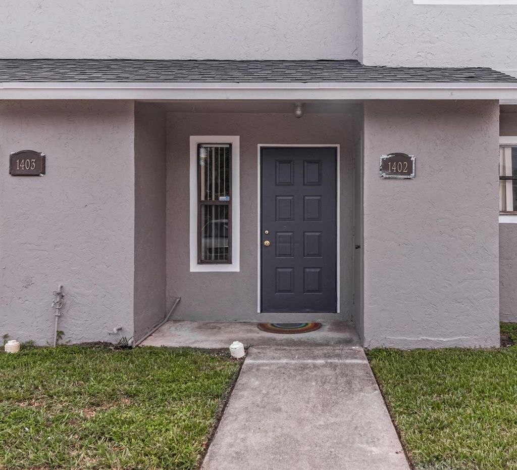 Photo of 1402 Wharf Lane, Greenacres, FL 33463 (MLS # R11166744)