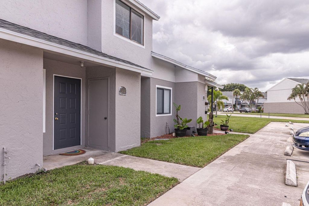 Photo of 1402 Wharf Lane, Greenacres, FL 33463 (MLS # R11166744)
