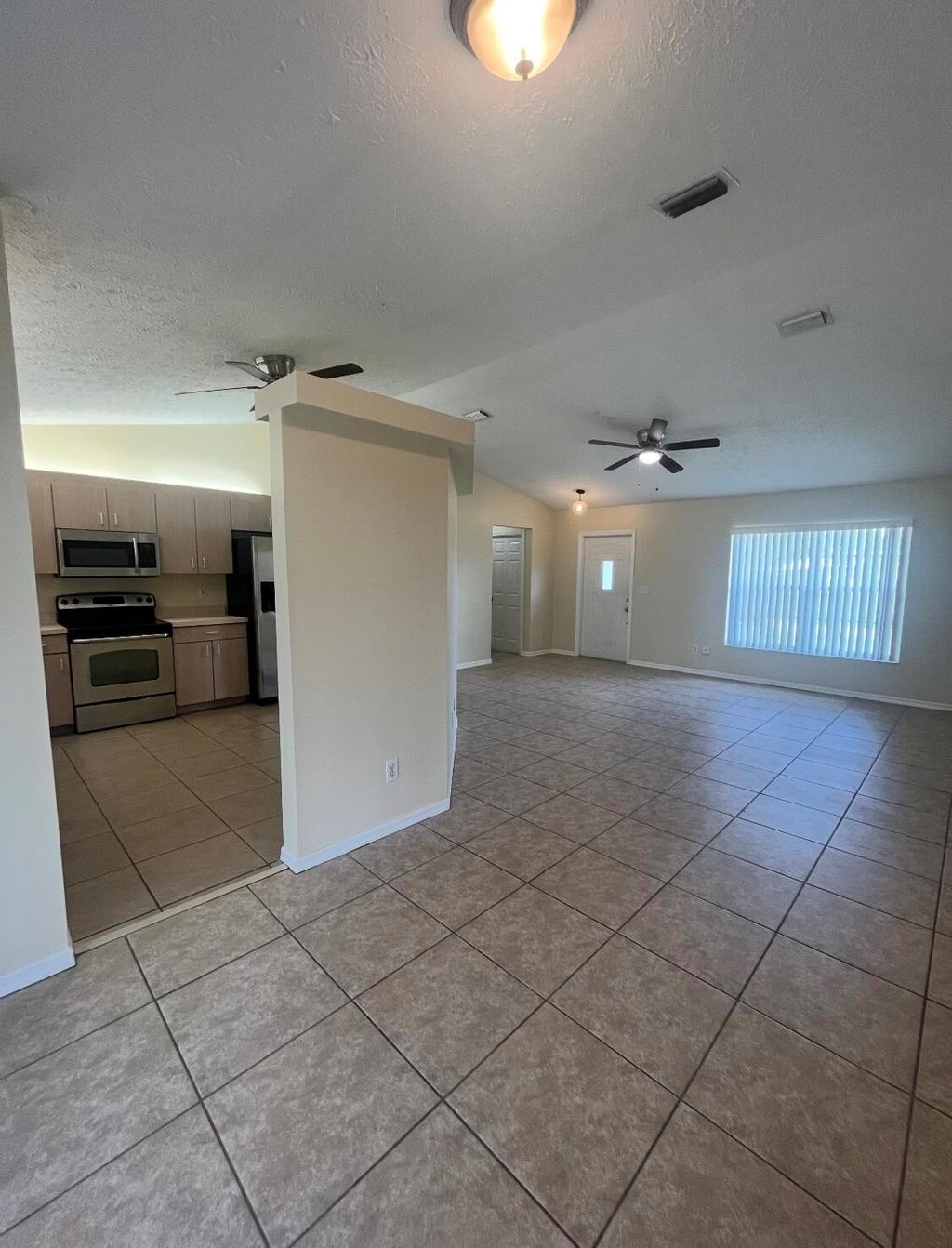 Photo of 302 SW Carter Avenue, Port Saint Lucie, FL 34983 (MLS # R11128959)
