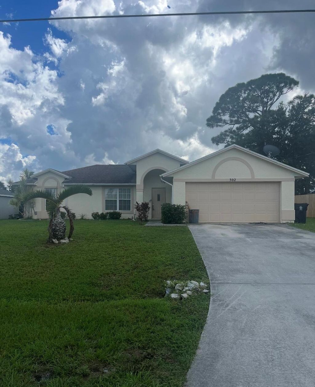 Photo of 302 SW Carter Avenue, Port Saint Lucie, FL 34983 (MLS # R11128959)