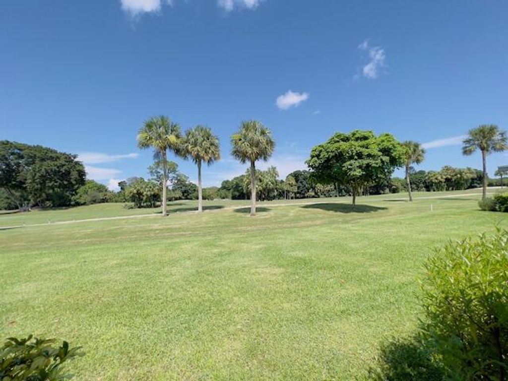 Photo of 13564 Whispering Lakes Lane, Palm Beach Gardens, FL 33418 (MLS # R11123147)