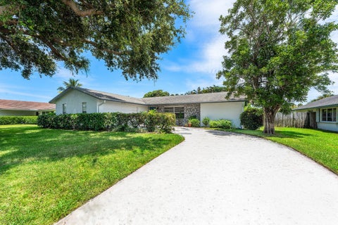 Photo of 11592 Ficus Street, Palm Beach Gardens, FL 33410 (MLS # B26064578)