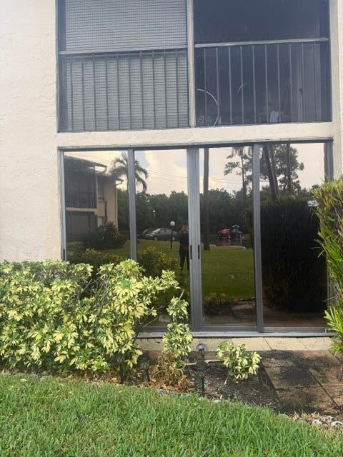 Photo of 445 PINE GLEN Lane #A-1, Greenacres, FL 33463 (MLS # B26069494)
