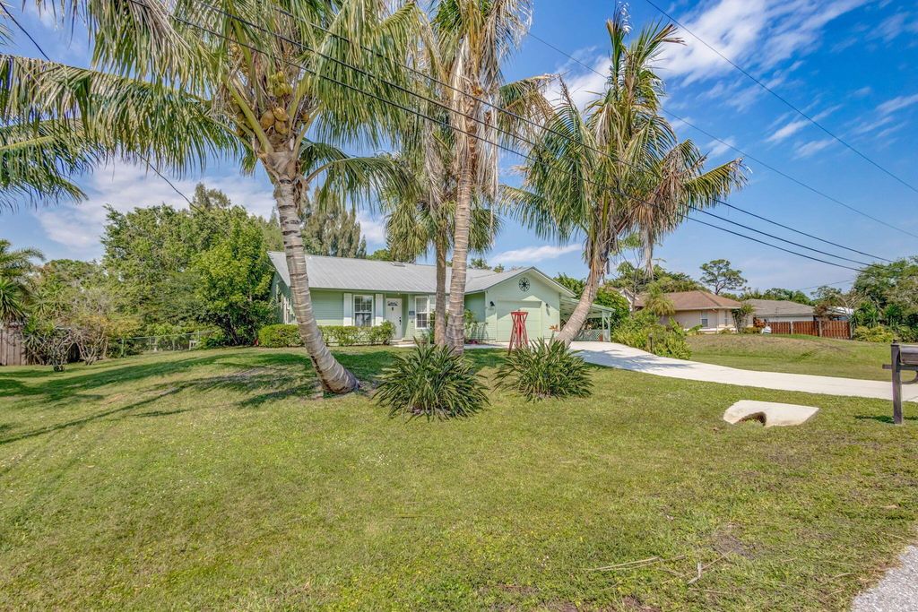 Photo of 5803 SE Orange Blossom Trail, Hobe Sound, FL 33455 (MLS # R11069868)