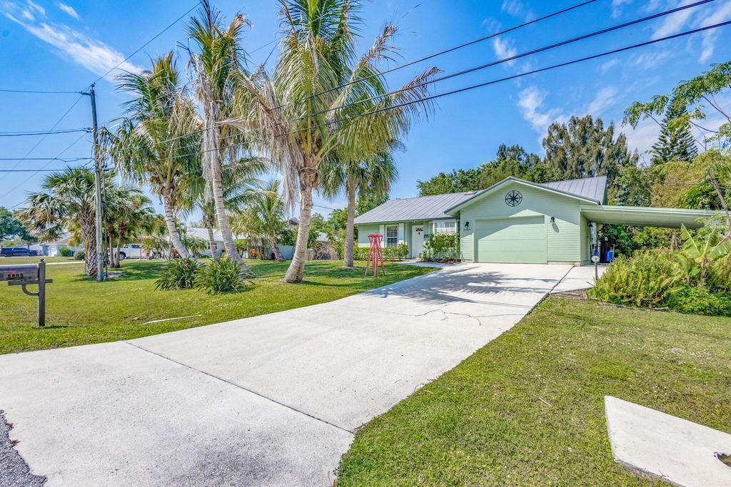 Photo of 5803 SE Orange Blossom Trail, Hobe Sound, FL 33455 (MLS # R11069868)