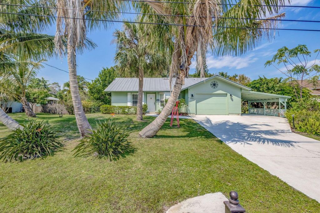 Photo of 5803 SE Orange Blossom Trail, Hobe Sound, FL 33455 (MLS # R11069868)