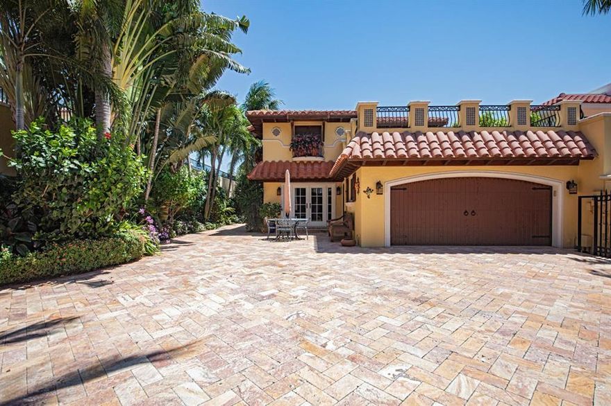 Experience luxury living in this custom, private, gated waterfront estate within the exclusive guard-gated community of Pelican Harbor. This masterpiece boasts 3 spacious bedrooms, a large loft, and top-tier finishes throughout. The first-floor primary suite offers breathtaking direct water views. A grand staircase leads to two additional bedrooms, a loft, and a sundeck. Enjoy stunning Intracoastal views from the waterfront pool and patio. The chef's kitchen features premium appliances, and the bathrooms exude elegance. Nestled on an oversized lot, Pelican Harbor offers boutique amenities, including two community pools, lighted tennis and pickleball courts, a gym, and a waterfront clubhouse with a deck.