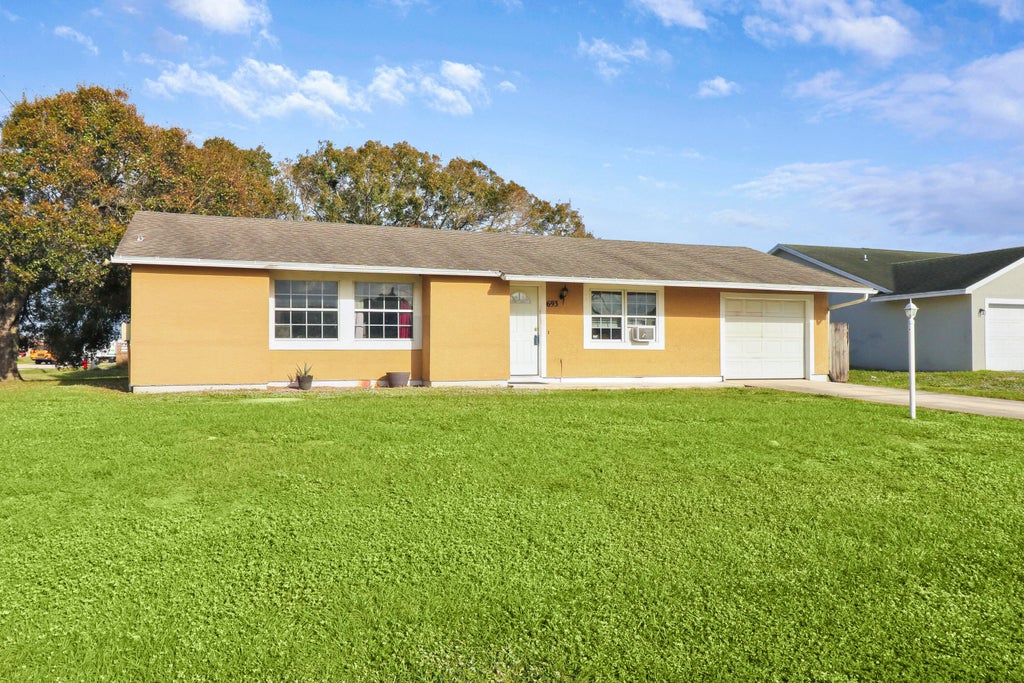 Photo of 693 SW Nichols Terrace, Port Saint Lucie, FL 34953 (MLS # R10942090)