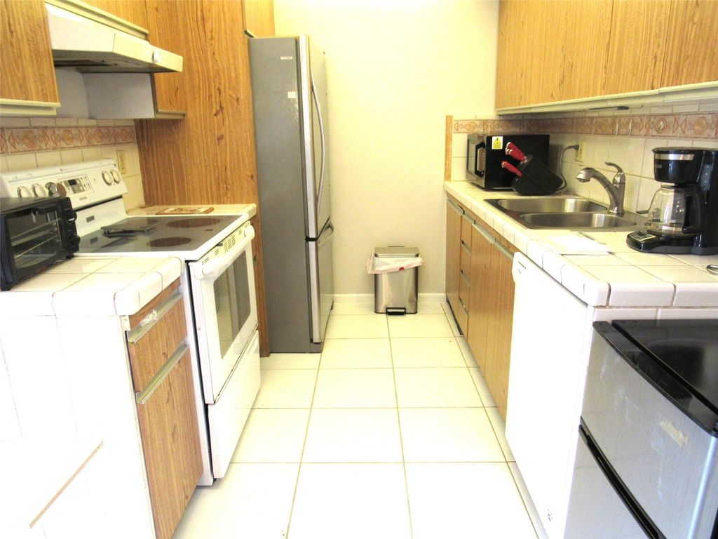 Photo of 2103 Lucaya Bnd #J2, Coconut Creek, FL 33066 (MLS # F10532259)