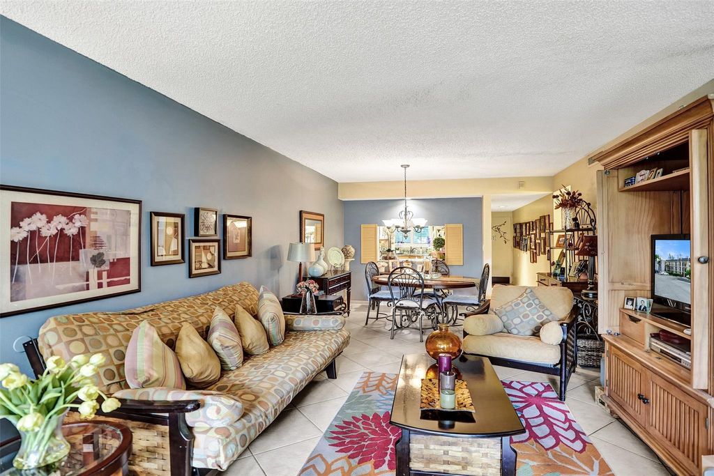 Photo of 8415 Forest Hills Dr #206, Coral Springs, FL 33065 (MLS # F10532220)