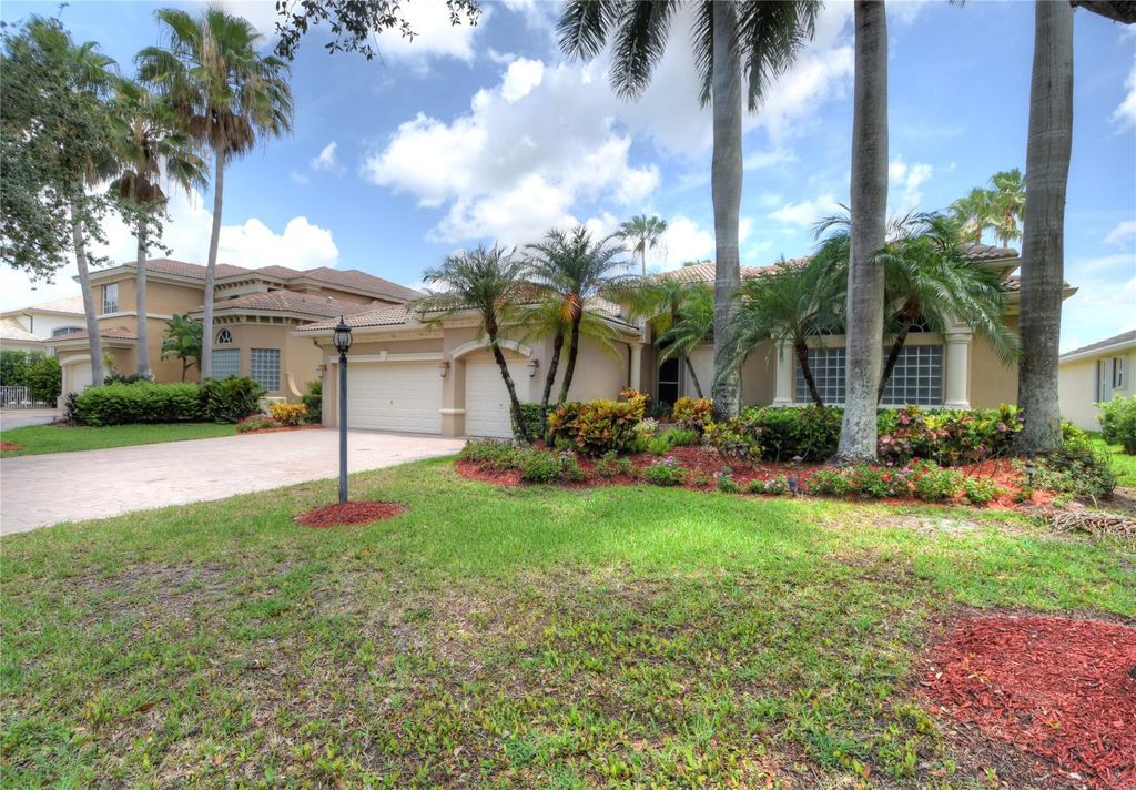 Photo of 12677 NW 65th Drive, Parkland, FL 33076 (MLS # F10506631)