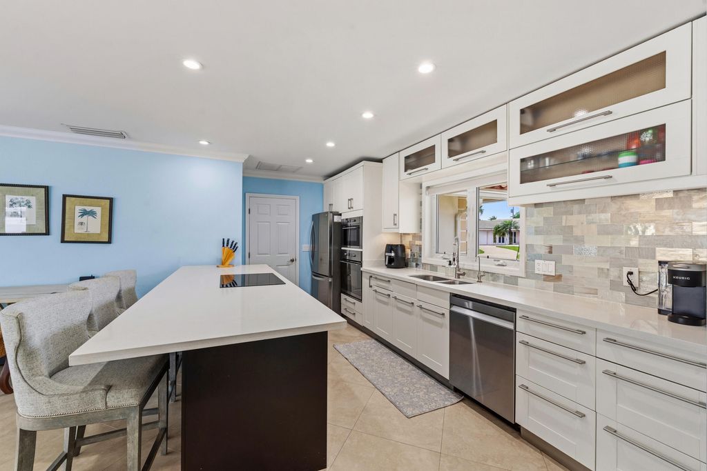 Photo of 1205 Dolphin Road, Singer Island, FL 33404 (MLS # B26014521)
