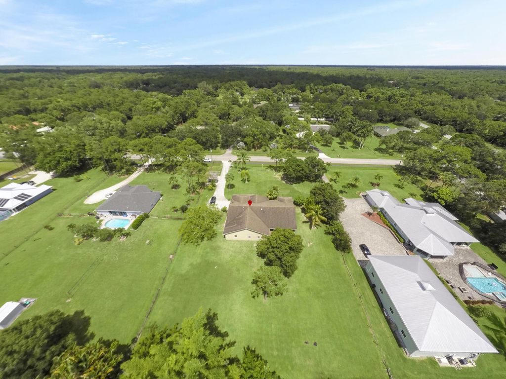 Photo of 16121 Mellen Lane, Jupiter, FL 33478 (MLS # R11112676)