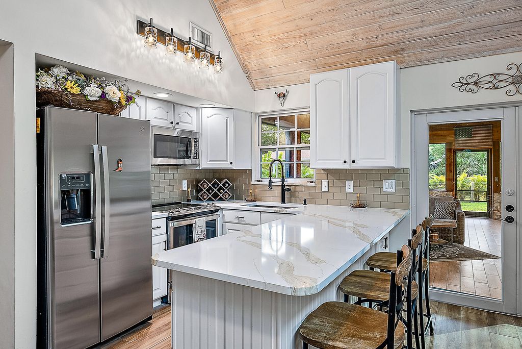 Photo of 15718 Haynie Lane, Jupiter, FL 33478 (MLS # R10957255)