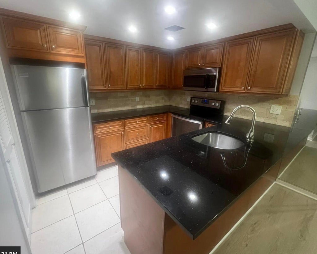 Photo of 4815 Sable Pine Circle #C1, West Palm Beach, FL 33417 (MLS # B26051443)