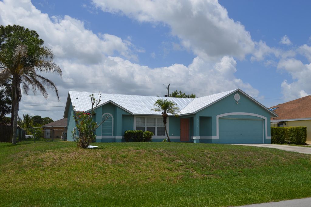 Photo of 1762 SW Whipple Avenue, Port Saint Lucie, FL 34953 (MLS # R10998871)