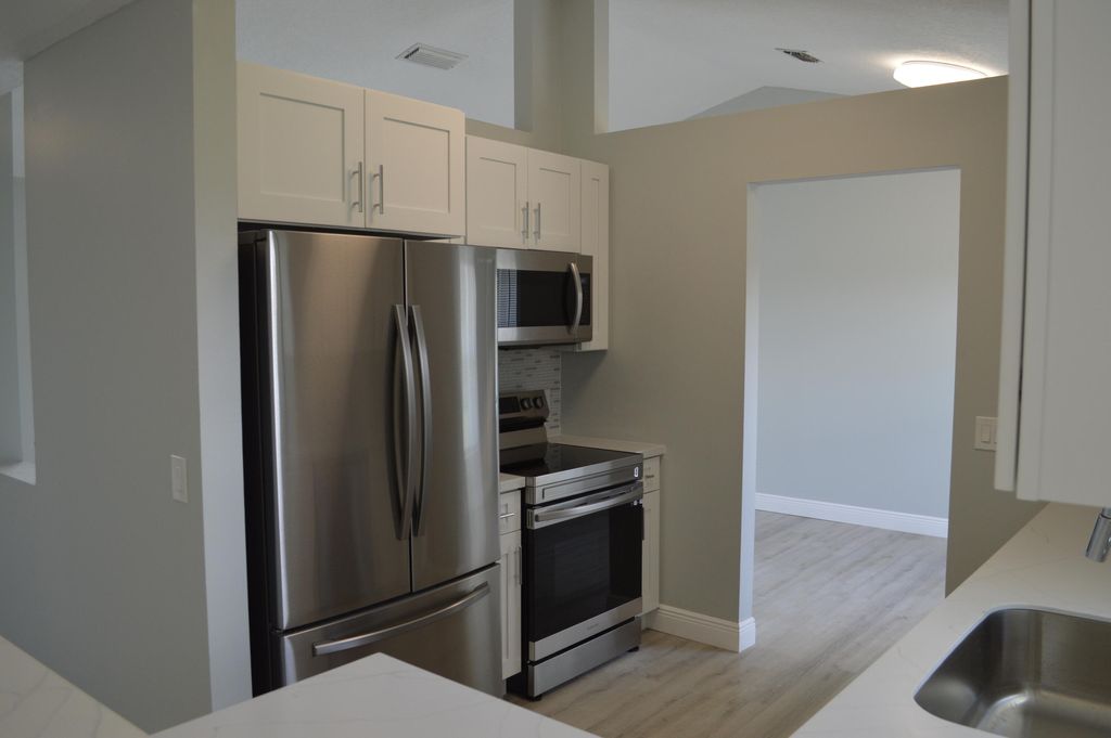 Photo of 1762 SW Whipple Avenue, Port Saint Lucie, FL 34953 (MLS # R10998871)