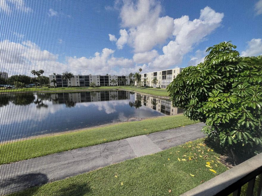 Totally renovated gorgeous Lancaster model in building 32 of section 4 in Huntington Lakes. Great southern exposure with one of the widest lake views in all of the community. Tiled throughout with plank tiling which looks like the type of wood laminate flooring. Unit comes completely furnished. Full sized side by side washer dryer in additional utility room. Primary bedroom with two walk-in closets. Both renovated bathrooms have stall showers. Kitchen boasts of roll-out pantry drawers and undercounter lazy susan corner for full usage of storage space. Upgraded stainless steel appliances. A/C has been updated along with the water heater as well. Building located directly across from the outdoor sect 4 heated satellite pool.