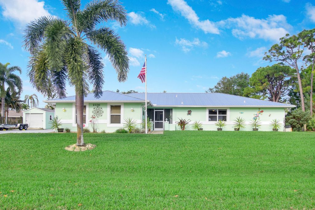 Photo of 2186 SE Bisbee Street, Port Saint Lucie, FL 34952 (MLS # R10784446)