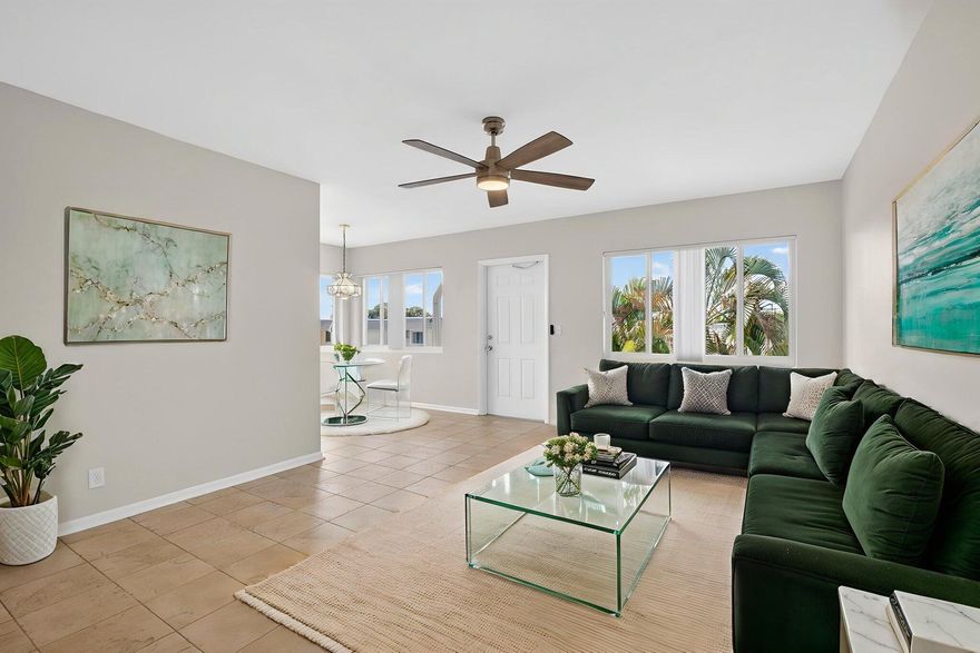 This is a jewel of a unit. 2 bedrooms/1 bath. Large WIC. Gorgeous tile floors mimicking travertine. High-end renovation in kitchen w/premium cabinets & granite countertops. Lots of natural light because it's an end unit w/4 extra windows on East side of unit. NEW windows throughout including balcony overlooking pretty green space and private SFH neighborhood. Bldg 23 sits behind recreation bldg w/large pool, pickleball court, shuffleboard, bocce ball courts, putting green, BBQ area, auditorium, craft room, library, 2 gyms, saunas, etc. Bldg 23 sits on small hill providing views over neighboring buildings, Unit location in community provides tremendous privacy compared to other buildings & units here. Tinted windows help lower utility costs. Close 2 beach, 95, Tri-Rail. Grab this one quick! This is a well-managed 55+ development across from 750-acre John Prince Park and Lake Osborne.