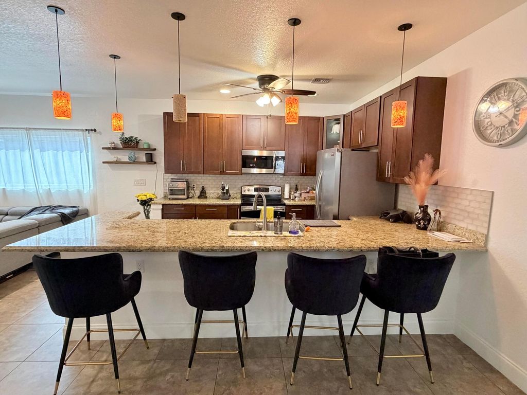 Photo of 243 SW 5th Street, Dania Beach, FL 33004 (MLS # B26006549)