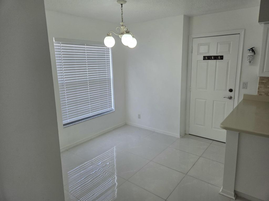 Photo of 3021 Casa Rio Court, Riviera Beach, FL 33418 (MLS # R11142240)