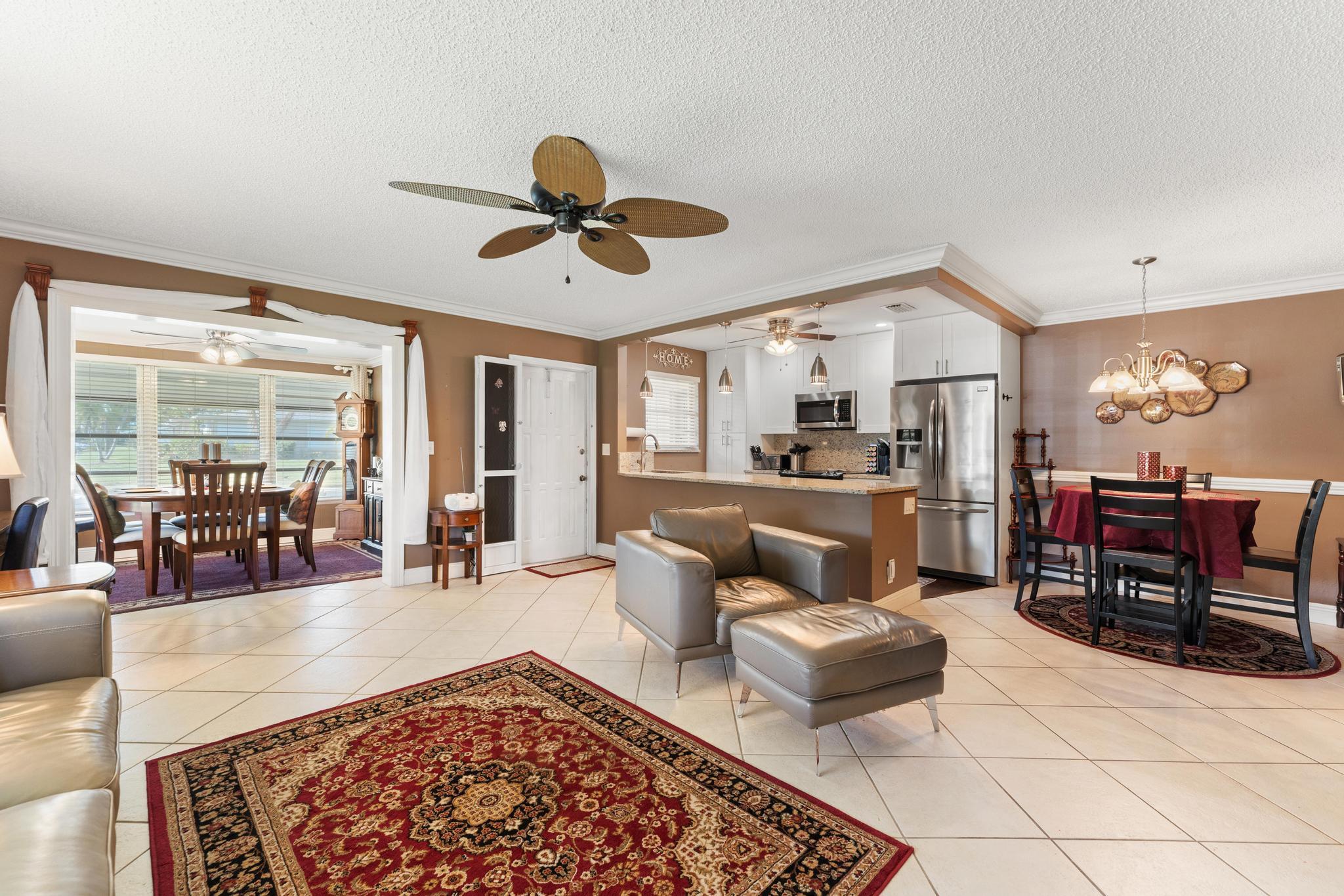 Welcome to the ONLY corner unit in this quiet 55 and older community, currently for sale. Coming into this, villa style, 2 BED, 2BATH condo, you immediately notice the modest, fresh, paint done. Crown molding and baseboard trim work. A tastefully renovated kitchen with upgraded appliances. Diagonally across the kitchen is a Florida Room. Handicap accessible layout, leading to the master bedroom and bath. A California Closet set up in the master closet. Cool air from the 2021 A/C, and annually inspected. The Community, itself, is situated inland, about 3 miles from the Atlantic Ocean, 2 miles from ''downtown'' Delray Beach, and 1 mile from the Delray Square Shopping Center. This unit is conveniently located close to the entrance of the community on Barwick Rd. PRICED TO SELL. Come on in.