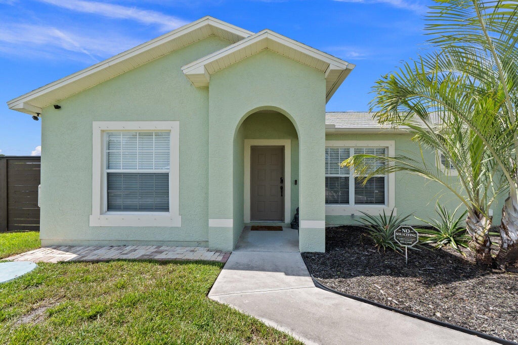 Photo of 5789 NW Belwood Circle, Port Saint Lucie, FL 34986 (MLS # R11140426)