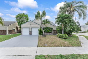 BRAND NEW ROOF & UPDATED IN 2025!! Welcome home to one of the best values in Boca Raton! This beautifully remodeled 4 bed, 2 bath single family, single story home is located in Trends At Boca Raton. This property has it all including a prime corner lot with fully fenced back yard, extremely LOW HOA, community swimming pool & tennis courts! Home includes new A/C (2023) , solar panels, underground propane gas, electric generator hook-up, modern kitchen, updated bathrooms, stainless steel appliances, granite countertops, NO CARPET, waterproof vinyl plank-wood flooring throughout, all age community, pet friendly, freshly painted, impact glass windows, master suite features a walk-in closet and a large shower in the ensuite bath, brand new irrigation system & so much more!