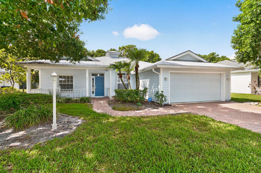 Photo of 631 NE Muskrat Run, Port Saint Lucie, FL 34983 (MLS # B26033434)