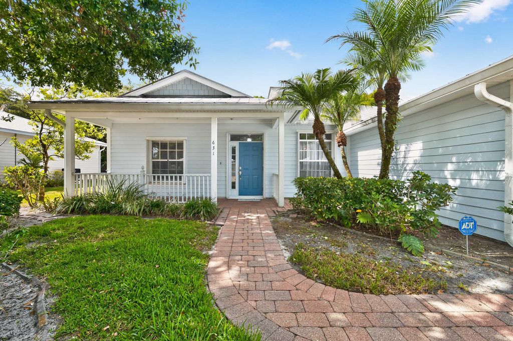 Photo of 631 NE Muskrat Run, Port Saint Lucie, FL 34983 (MLS # B26033434)