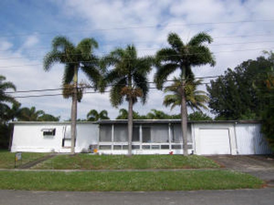 Own your lot. Devenez proprietaire de votre terrain.No immediate rear neighbors. Near pool and clubhouse. Tear down and install manufactured home of your choice. Or roll up your sleeves and re-hab (it's a mess). Community is well managed. Near all possible conveniences, amenities, shopping yet quiet. No expensive gates to maintain; one way in, same way out for secured living.  Truly a great spot!Beautiful Palm trees on property.