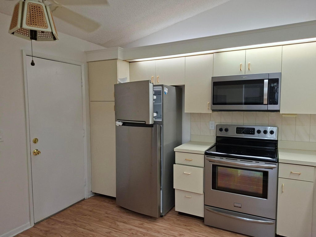 Photo of 10032 Andrea Lane, Boynton Beach, FL 33437 (MLS # B26061147)